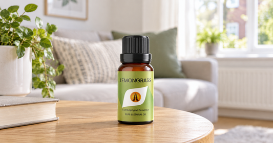 Lemongrass Pure Essential Oil on a table in a bright compact living room.